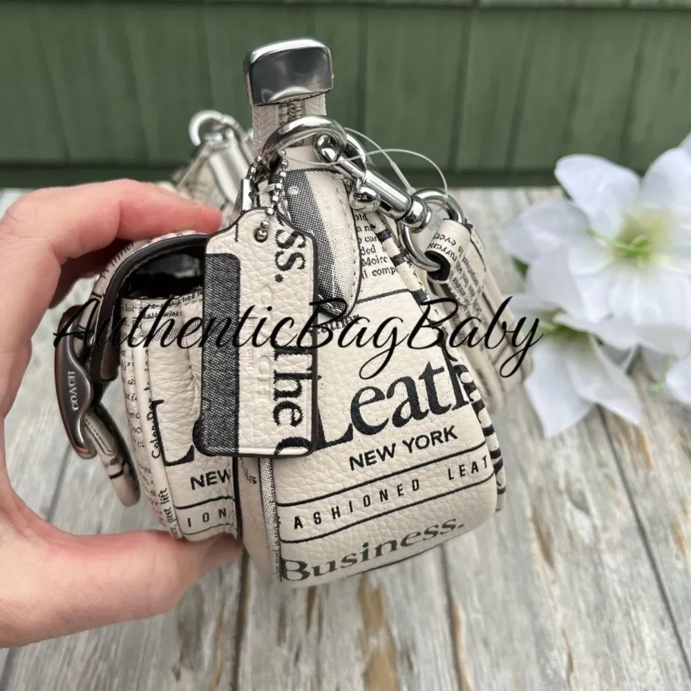 Coach Ashton Pebbled Leather Shoulder Bag With Newspaper Print Purse